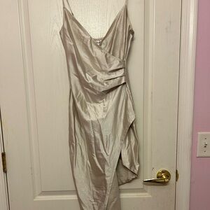 Champagne colored sparkly dress with high cut on left leg